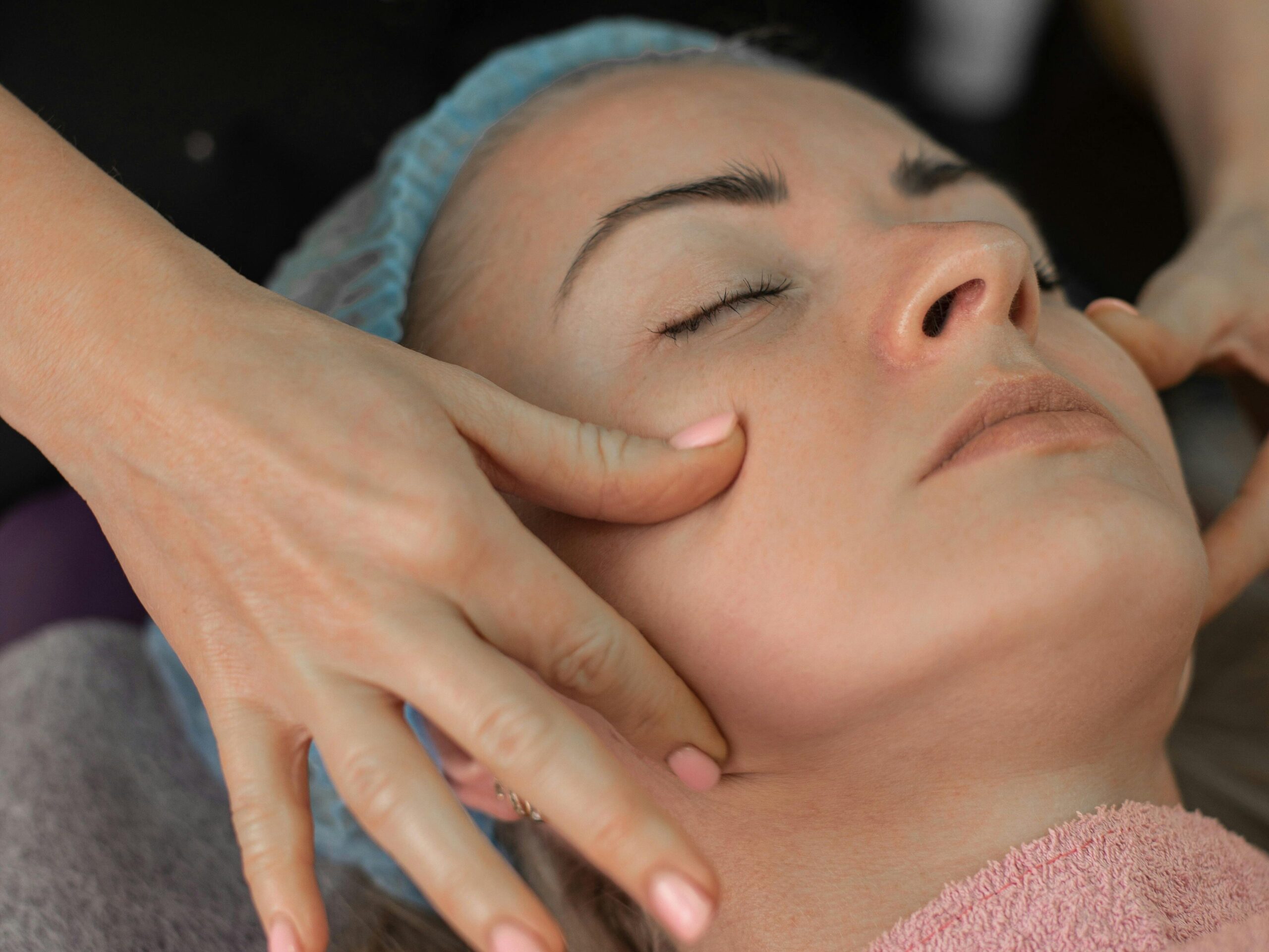 Woman getting a facial massage